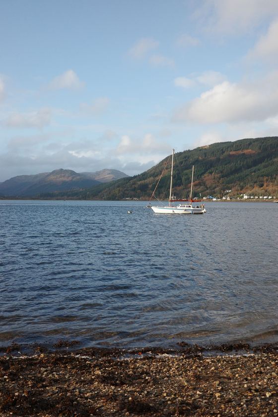 Dunoon: Sailboat against hills across the loch