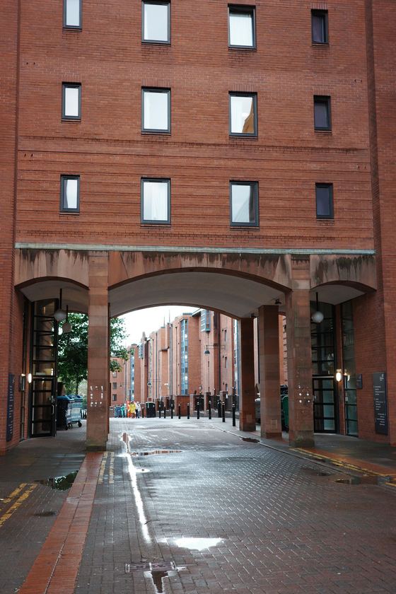 Strathclyde campus: Brick arch framing wet campus walkway