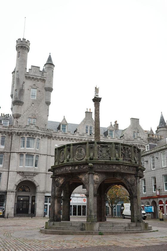 City Centre: Mercat Cross against historic buildings