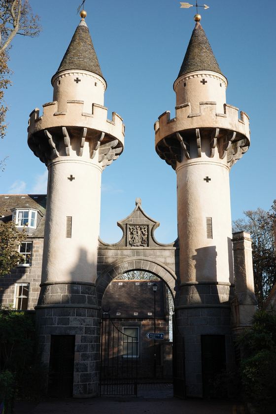 University of Aberdeen: Twin turreted gateway in sunlight
