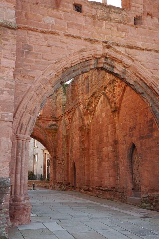 Docks: Stone arch framing abbey interior
