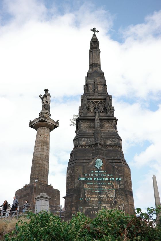 Necropolis: Tall memorial against blue sky