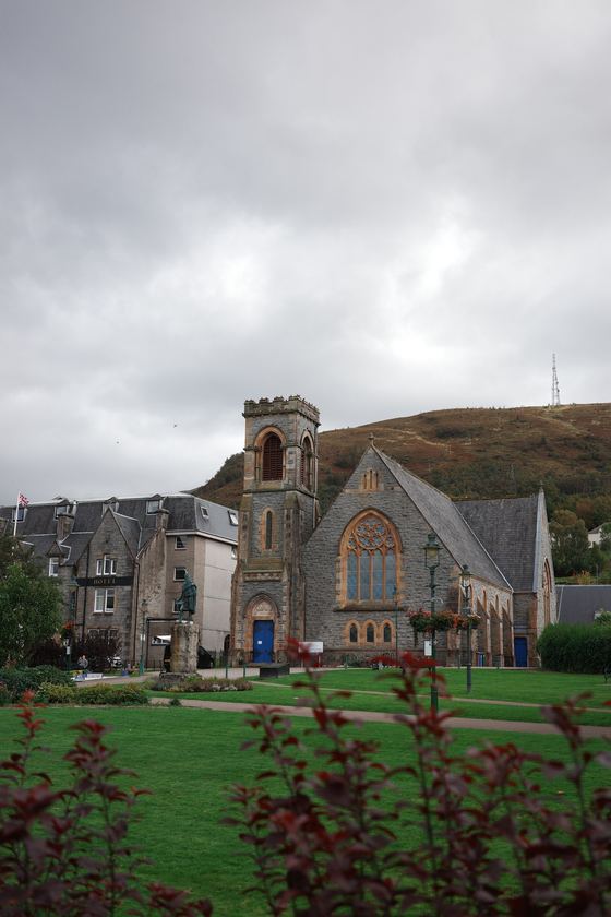 Fort William: Stone church beneath cloudy sky