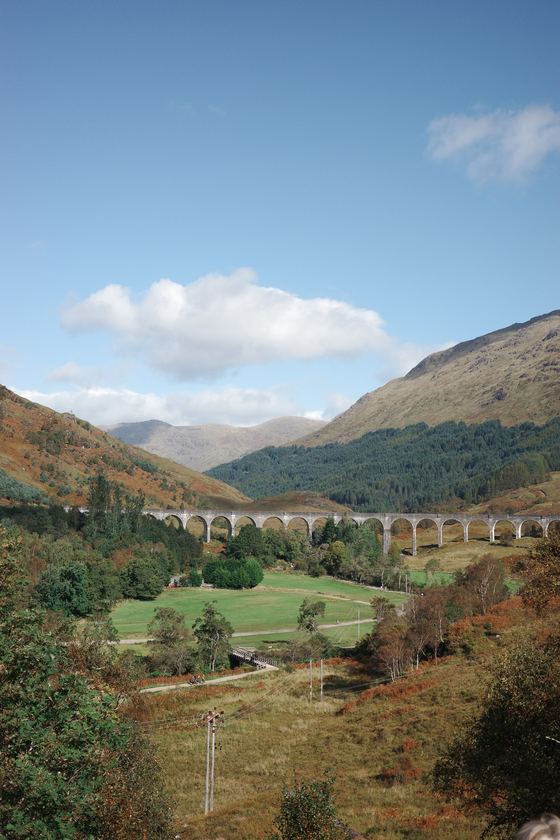Glenfinnan Viaduct: Distant viaduct across green valley