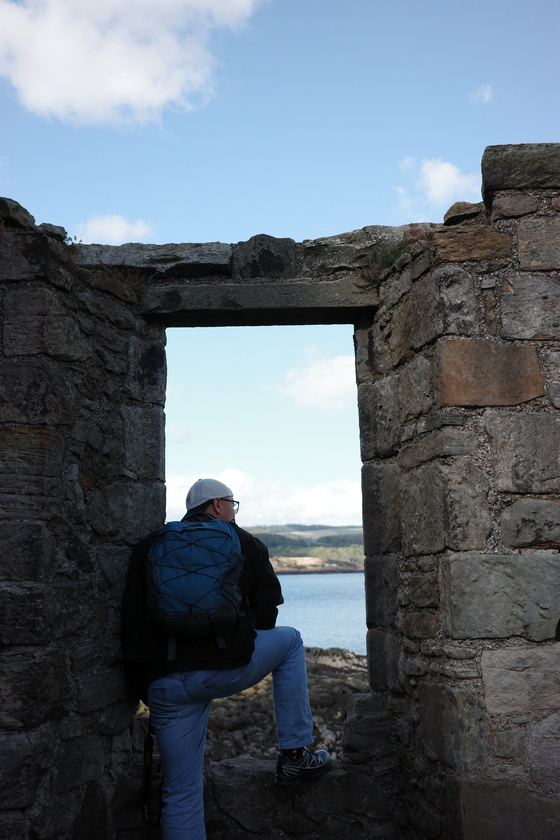 Inchcolm Island: Seated figure framed by ruined arch
