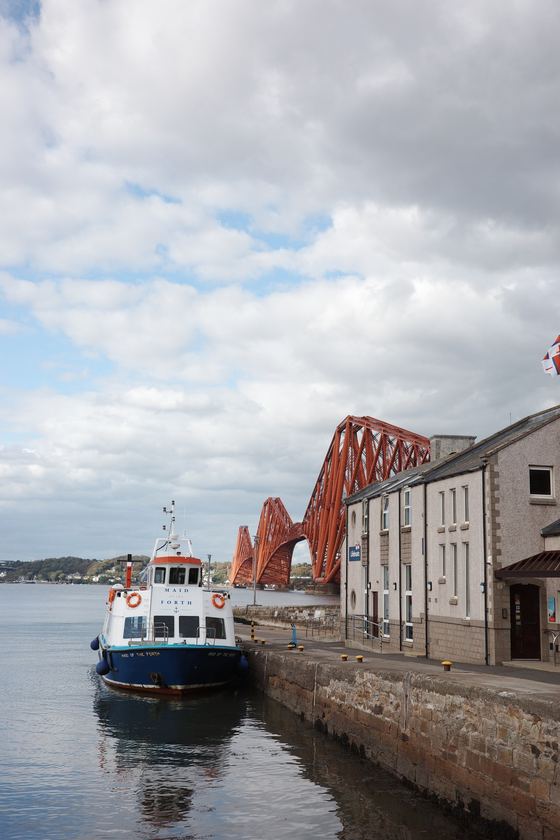 Queensferry: Ferry beside quay and red bridge