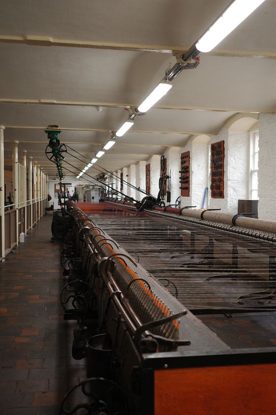Lanark: Long textile room with receding machinery