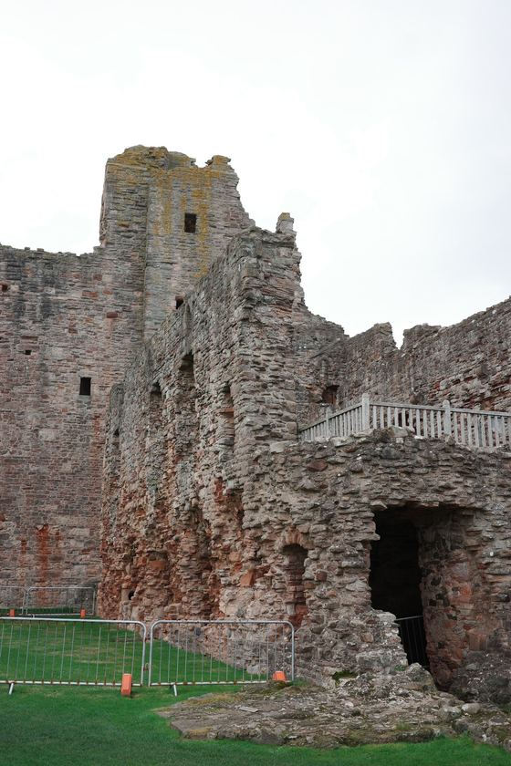 Tantallon Castle: Castle gateway above green courtyard