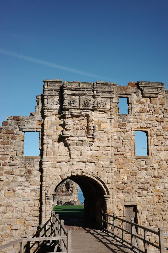 Cathedral and Castle: Castle gateway framed against blue sky