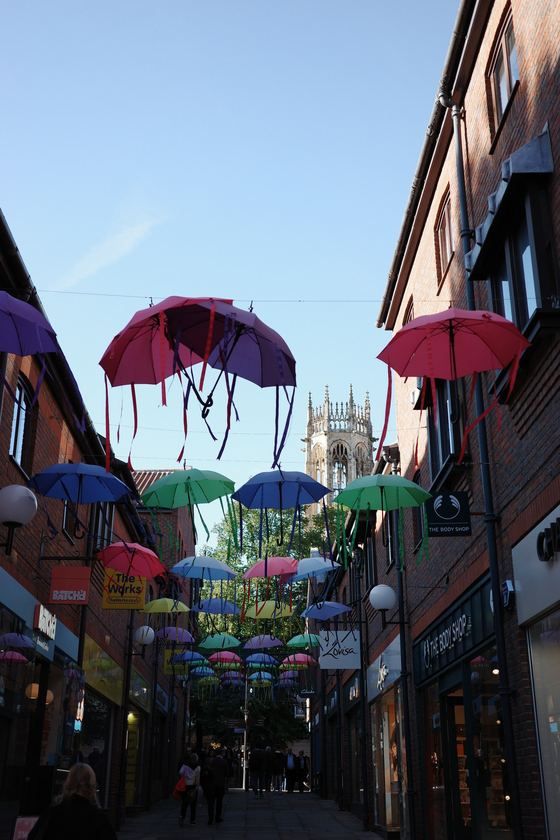 York: Colourful umbrellas above a narrow street