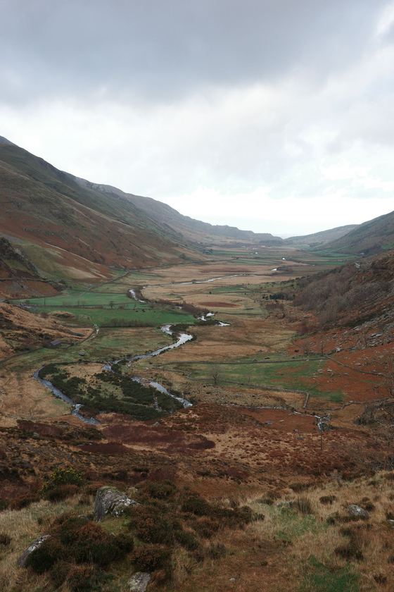 Snowdonia and Llanfairpwll: Winding stream through a broad valley