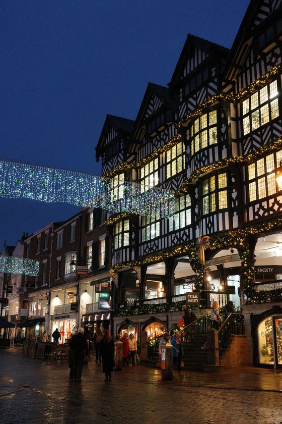 Chester: Illuminated half timbered buildings at dusk