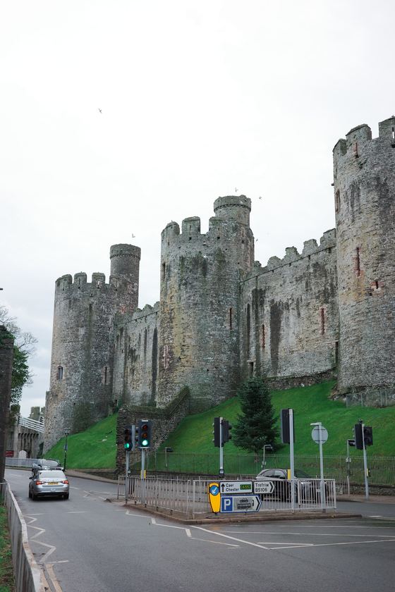 Conwy and Llandudno: Conwy Castle rising above the road