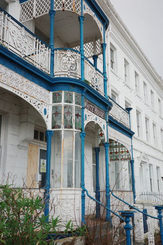 Conwy and Llandudno: Blue Victorian balcony on seaside facade