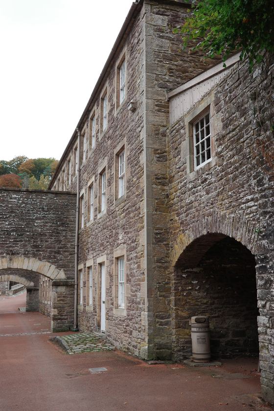 Lanark: Stone mill facade and arched entrance