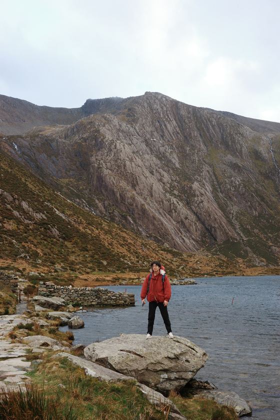 Snowdonia and Llanfairpwll: Red jacket beside the mountain lake